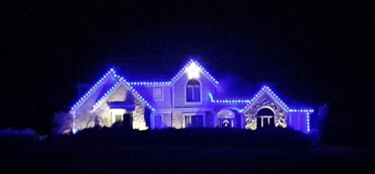 All blue cool white C9 LED lights on large estate at night