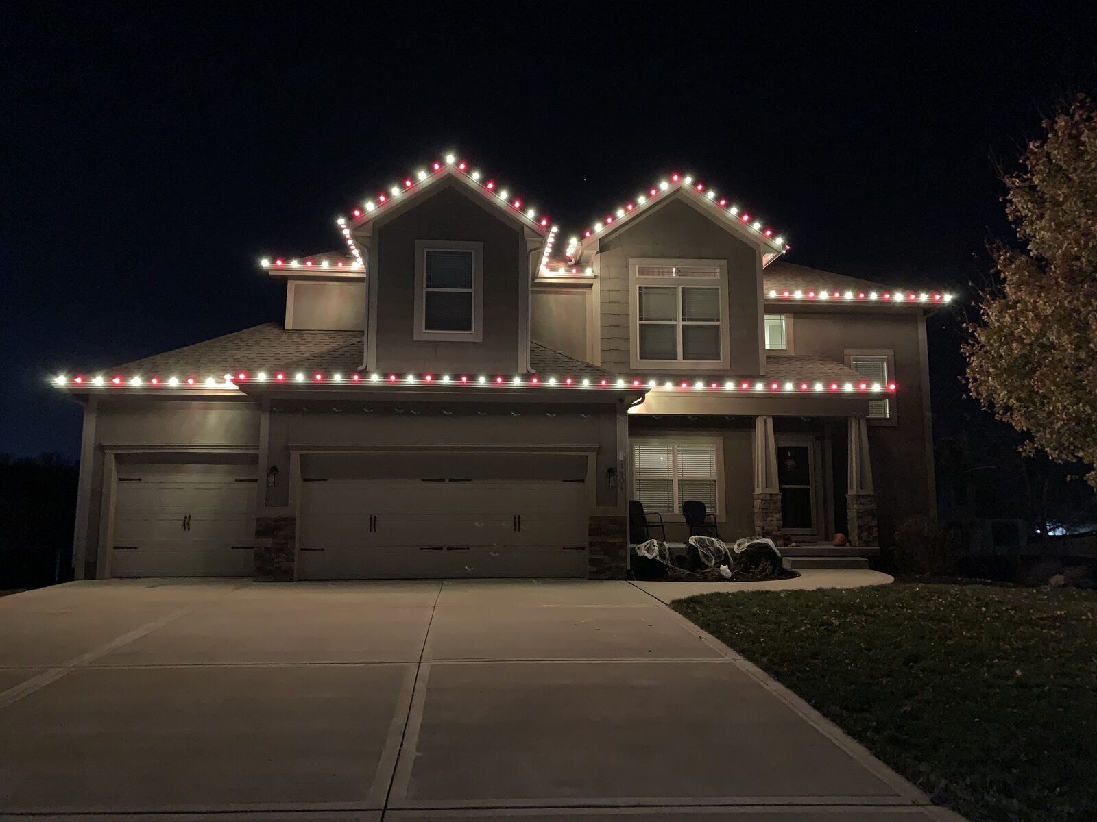 Christmas lights on home roofline — Reign Enterprises Kansas City